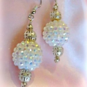 Iridescent white, disco-bead earrings*.