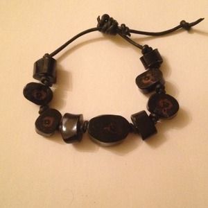 Genuine black coral bracelet leather adjusts size