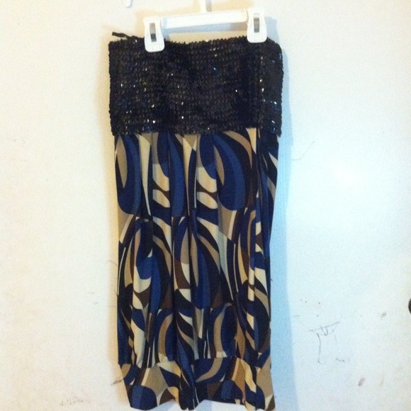 Black Sequined strapless dress.