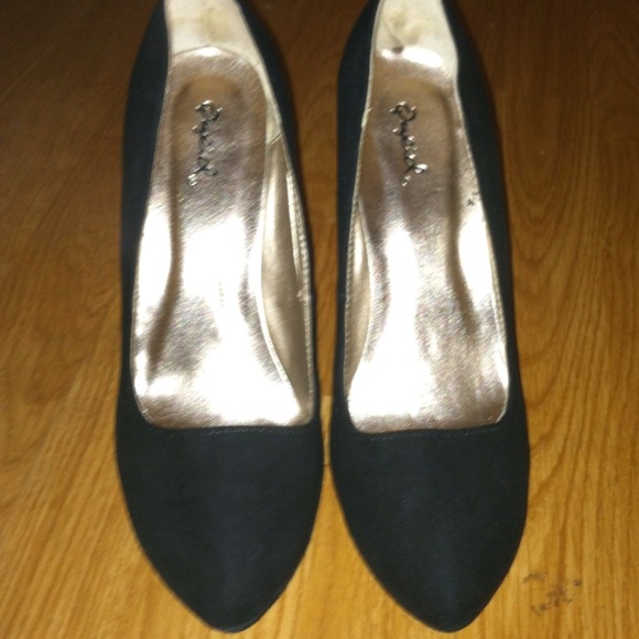 Black wedge heels.