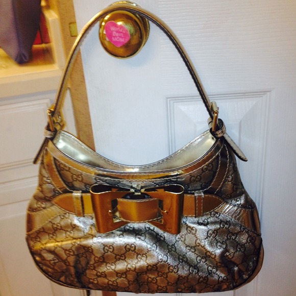Stunning metallic Gucci purse
