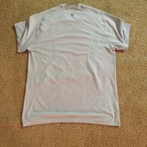 2 lululemon men's shirts and a pair of shorts