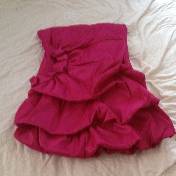 A hot pink "bubble" semi-formal dress