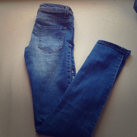 2 pairs of jeans **bundled**