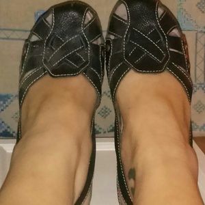 Black BearTraps brand sandals. Genuine leather