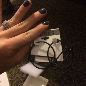 Black guess hoop earrings