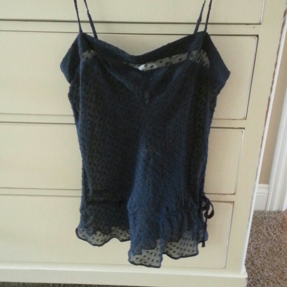 Sheer thin strap shirt.