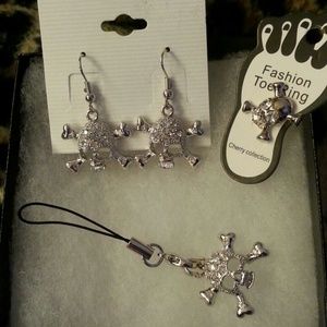 Trio of skull jewelry
