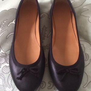 Sold on ebay J crew black ballet flats. Bow at top
