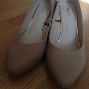 Express almond toe wedge pumps