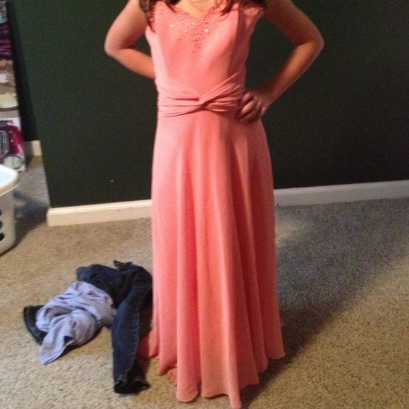 Beautiful coral strapless hi low dress with corset