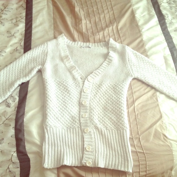 White cardigan.