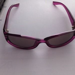 Authentic Gucci Sunglasses; never worn; purple