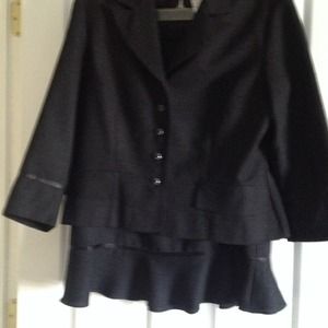 Black suit jacket with matching skirt