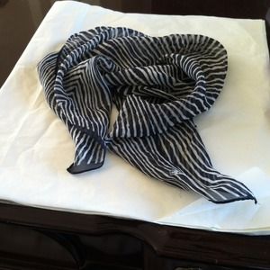 Black/white striped scarf.