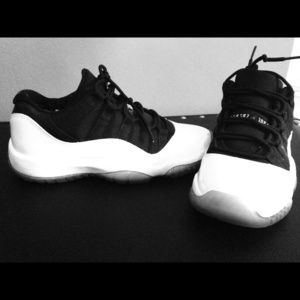Jordan's!! Tuxedo low-top 11's!