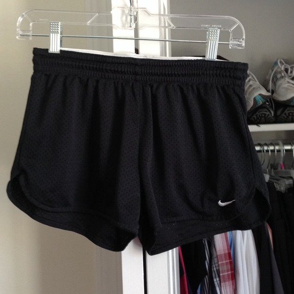 100% polyester Nike running shorts.