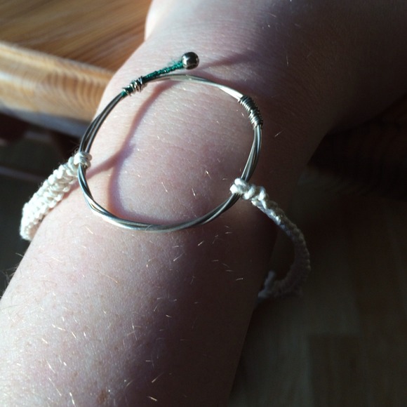 Adjustable bracelet with guitar string