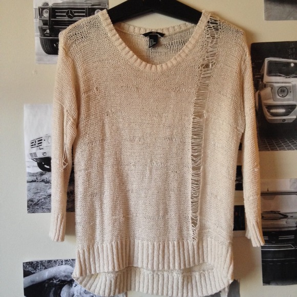 edgy cream sweater