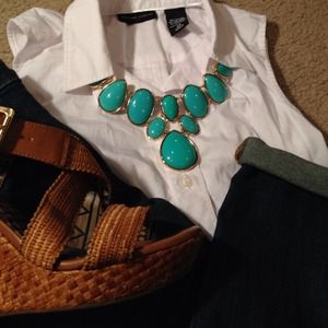 Classy white sleeveless button up