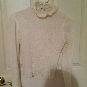 Ivory peasant style blouse.