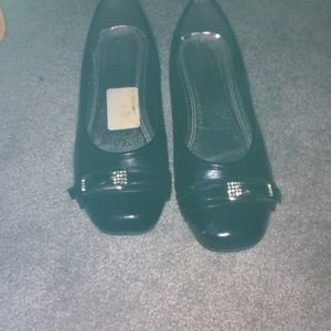 REDUCED TO $8. Black flats