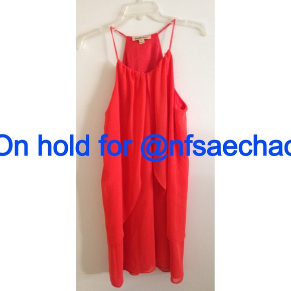 Bright orange mini dress. Very flowy. Never worn