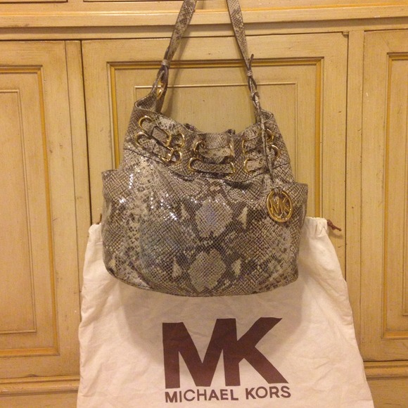 Authentic Michael Kors embossed leather