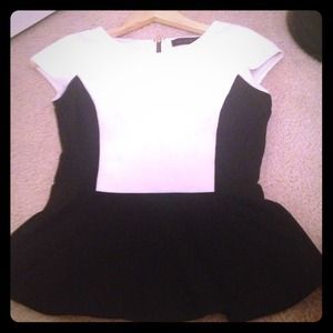 Limited black and white peplum top