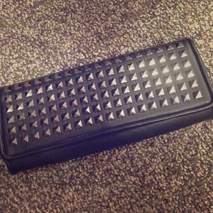 Black studded clutch