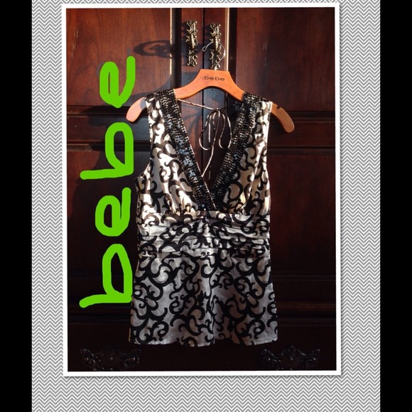 PRICE REDUCED! Bebe silk top.