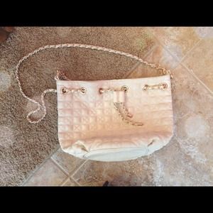 Cream colored link purse