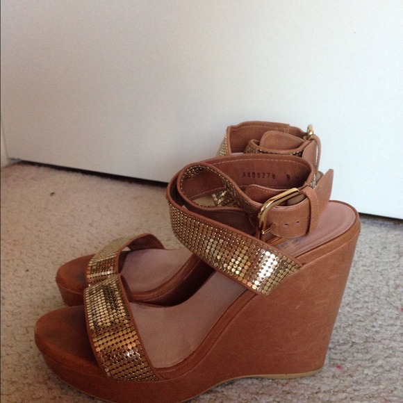 On Hold ------Stuart Weitzman Gold strap wedges