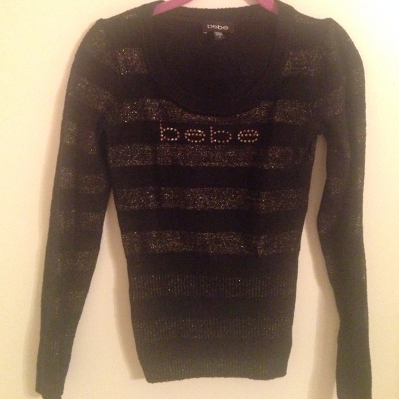 Bebe sweater black with golden stripes