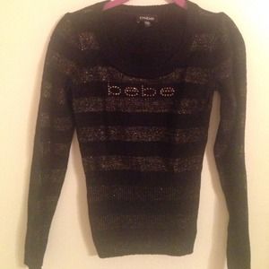 Bebe sweater black with golden stripes