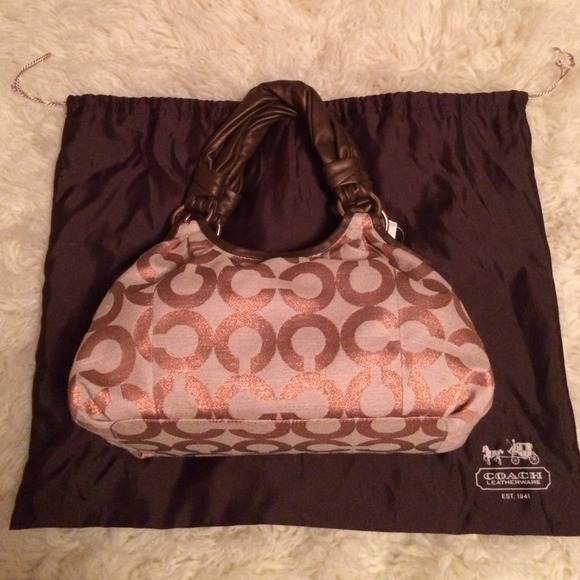 Coach Handbags - Auth Coach rosegold/ bronze handbag