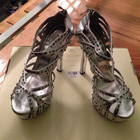 Bebe sexy silver studded strappy stilettos!