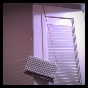 Urban Expressions white metal clutch- bag