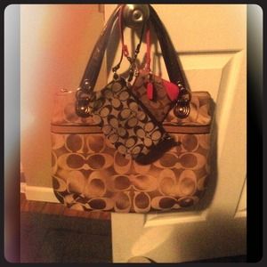 One large brand new coach bag and two wristlets