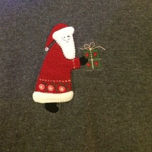 Ugly Christmas sweater with Santa on the front!