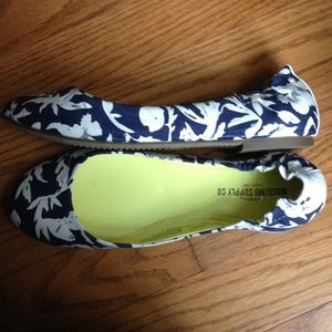 Blue and white patterned flats