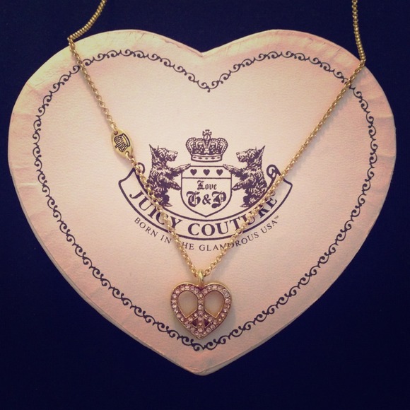 Juicy Couture gold peace heart necklace!