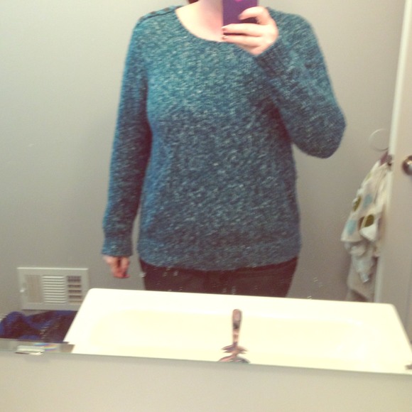 Teal long sleeve sweater also in a brownish gold