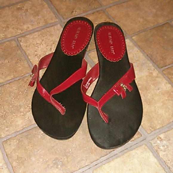 Red and black sandals with ribbon