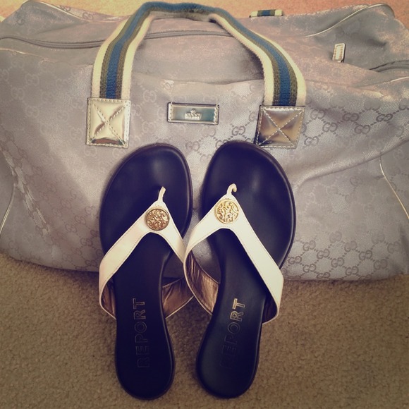 White flip flops with gold trim
