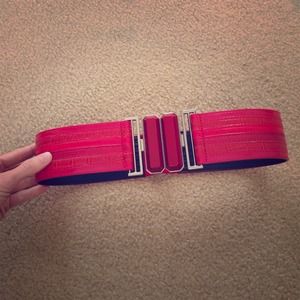Bright red belt that fits around the waist area