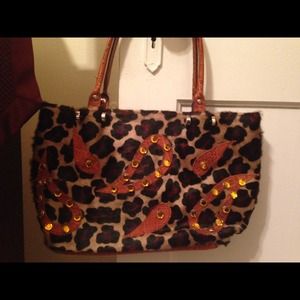 Pony hair and leather handbag
