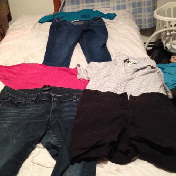 Three shirts two pairs of pants a pair shorts