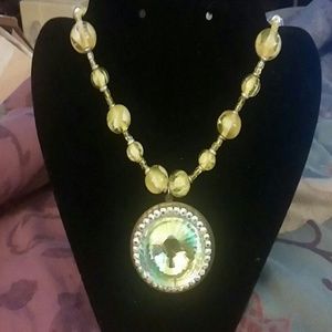 Yellow beaded necklace w/ glass crystal pendant