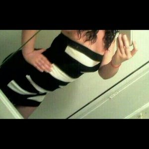 Black and white strapless dress.